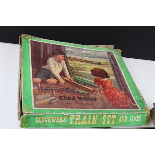 140 - Two early-mid 20th C boxed tin plate train sets to include Brimtoy Clockwork Train No 37/0 Colour GN... 