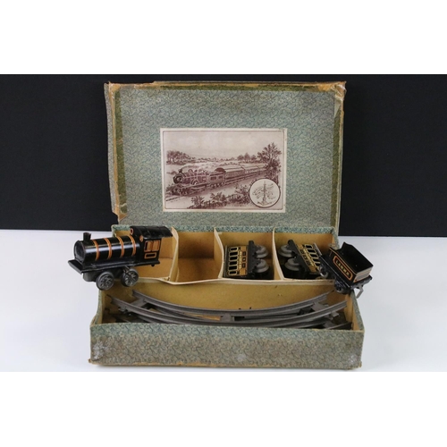 140 - Two early-mid 20th C boxed tin plate train sets to include Brimtoy Clockwork Train No 37/0 Colour GN... 