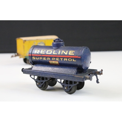 143 - 12 Hornby O gauge play worn items of rolling stock to include Cadbury's Chocolates, Fyffes Bananas, ... 