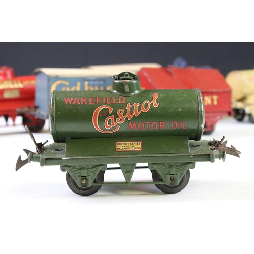 143 - 12 Hornby O gauge play worn items of rolling stock to include Cadbury's Chocolates, Fyffes Bananas, ... 