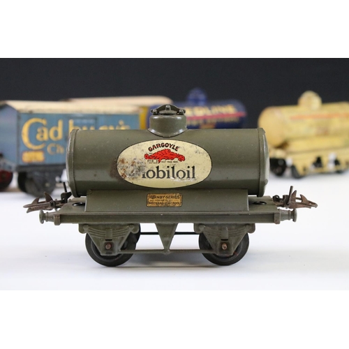 143 - 12 Hornby O gauge play worn items of rolling stock to include Cadbury's Chocolates, Fyffes Bananas, ... 