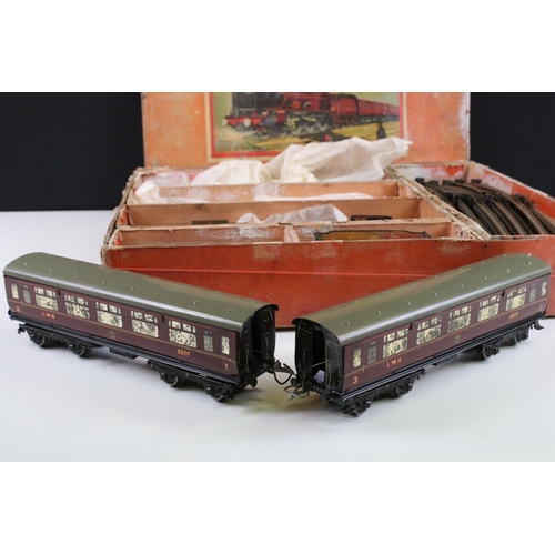 144 - Boxed Hornby O gauge Royal Scot train set containing Royal Scot 4-4-2 locomotive with tender, 2 x co... 