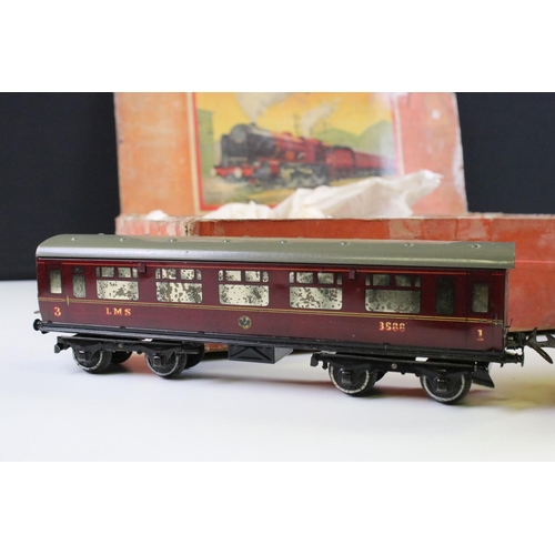 144 - Boxed Hornby O gauge Royal Scot train set containing Royal Scot 4-4-2 locomotive with tender, 2 x co... 