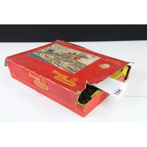 154 - Boxed Triang OO gauge RS27 train set plus a Triang Davy Crockett locomotive & tender, damage to box