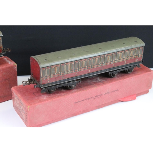 164 - Eight Hornby O gauge items of rolling stock to include 4 x boxed examples (No 2 Passenger Coach, No ... 