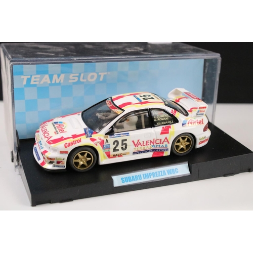 297 - Six cased 'Team Slot' slot cars to include 10604 Subaru Imprezza WRC 