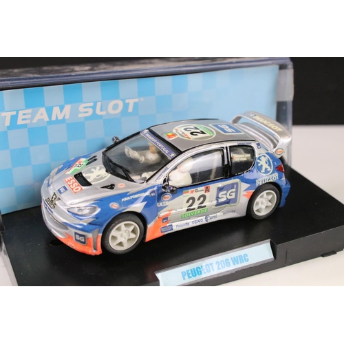 297 - Six cased 'Team Slot' slot cars to include 10604 Subaru Imprezza WRC 