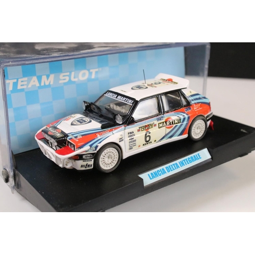 297 - Six cased 'Team Slot' slot cars to include 10604 Subaru Imprezza WRC 