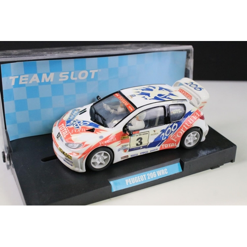 297 - Six cased 'Team Slot' slot cars to include 10604 Subaru Imprezza WRC 