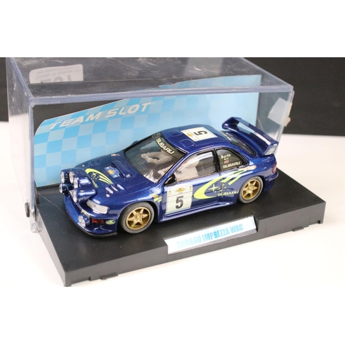 297 - Six cased 'Team Slot' slot cars to include 10604 Subaru Imprezza WRC 