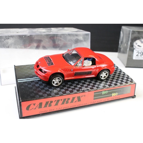 298 - Three cased Cartrix slot cars to include a BMW Z3, 0302-E Hyundai Accent WRC Catalunya 2000 and a 01... 