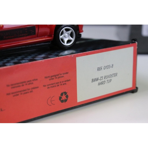 298 - Three cased Cartrix slot cars to include a BMW Z3, 0302-E Hyundai Accent WRC Catalunya 2000 and a 01... 