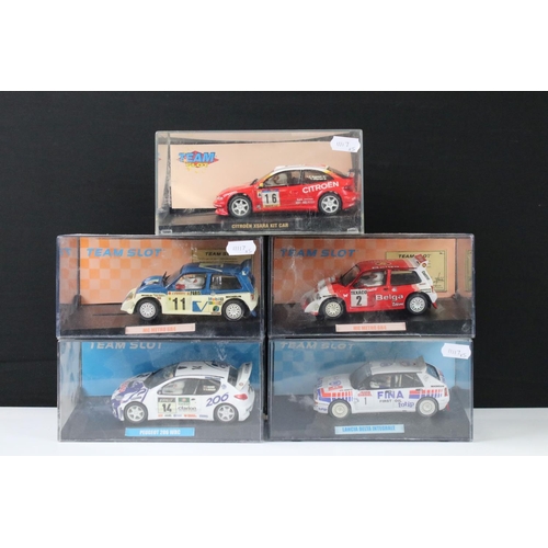 299 - Five cased 'Team Slot' slot cars to include 11001 Peugeot 206 WRC 