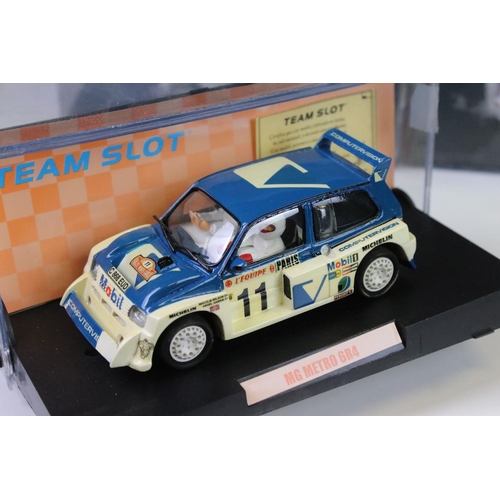 299 - Five cased 'Team Slot' slot cars to include 11001 Peugeot 206 WRC 