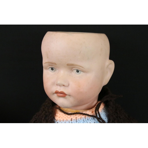 412 - Two Early 20th century Bisque Head Dolls including Kammer & Reinhardt Doll impressed mark 114 60, 41... 