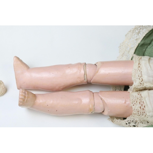 412 - Two Early 20th century Bisque Head Dolls including Kammer & Reinhardt Doll impressed mark 114 60, 41... 