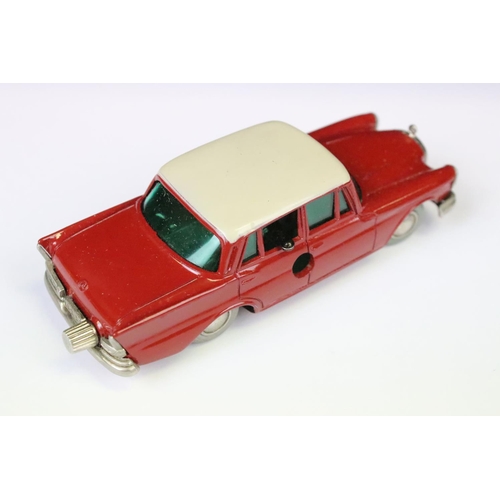 1365 - Boxed clockwork Schuco 1038 Mercedes 220S Micro Racer diecast model in red with white roof, with key... 