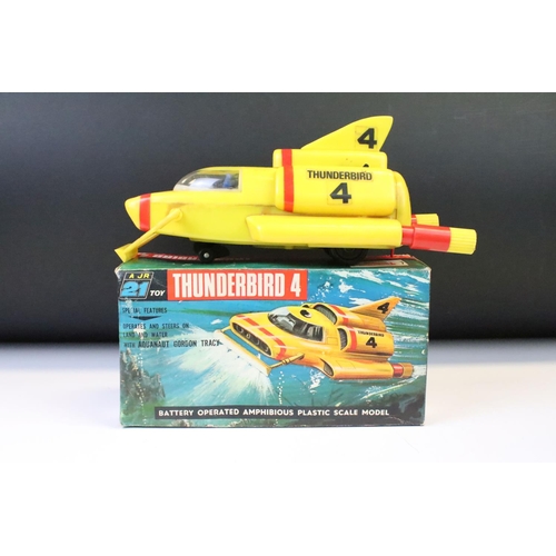 1378 - Boxed RJ Rosenthal battery operated Thunderbirds T4 model, ina  good play worn condition with gd box