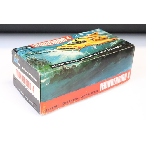 1378 - Boxed RJ Rosenthal battery operated Thunderbirds T4 model, ina  good play worn condition with gd box