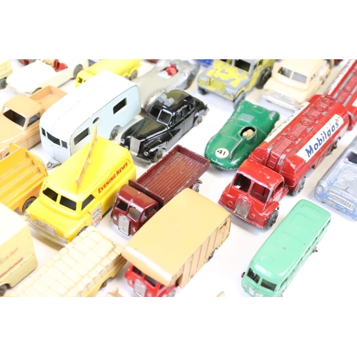 1303 - Over 65 mid 20th C play worn Matchbox Lesney diecast models, featuring No. 50 Commer Pick-Up MK VIII... 