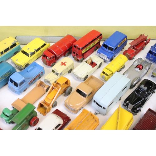 1303 - Over 65 mid 20th C play worn Matchbox Lesney diecast models, featuring No. 50 Commer Pick-Up MK VIII... 