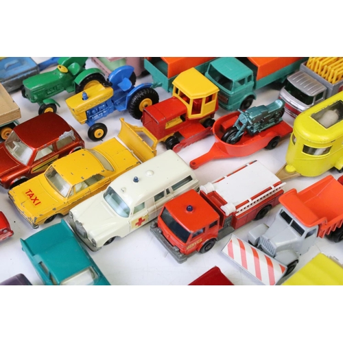 1307 - Over 45 mid 20th C Matchbox Lesney diecast models, diecast varies from showing paint chipping to vg