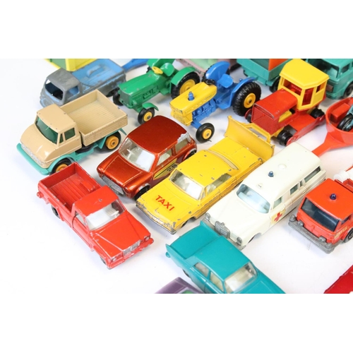 1307 - Over 45 mid 20th C Matchbox Lesney diecast models, diecast varies from showing paint chipping to vg