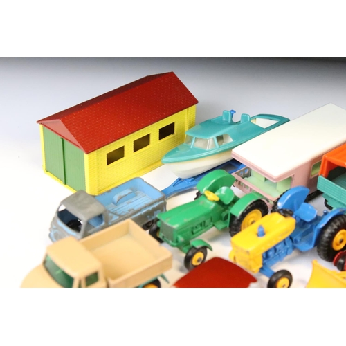 1307 - Over 45 mid 20th C Matchbox Lesney diecast models, diecast varies from showing paint chipping to vg