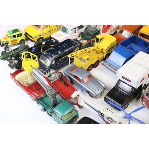 1309 - Around 35 play worn diecast models, mainly mid 20th C, to include Dinky, Corgi, Matchbox, Britains &... 