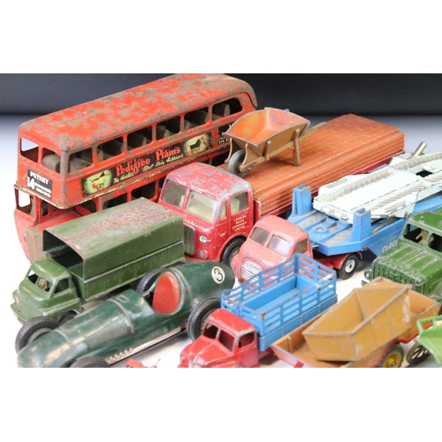 1312 - Around 35 mid 20th C play worn diecast & tinplate models to include Dinky, Corgi, Triang Spot-On and... 