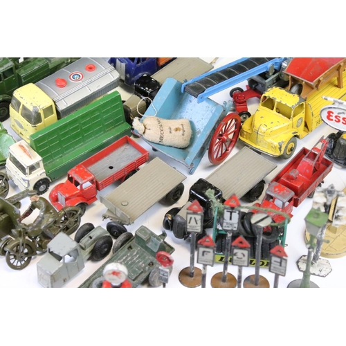 1312 - Around 35 mid 20th C play worn diecast & tinplate models to include Dinky, Corgi, Triang Spot-On and... 