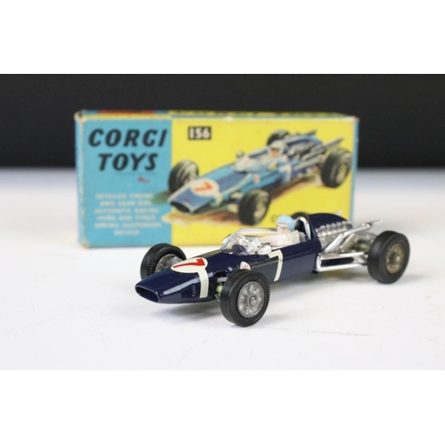 1338 - Three boxed Corgi F1 diecast models to include 154 Ferrari Racing Car, 155 Lotus Climax and 156 Coop... 