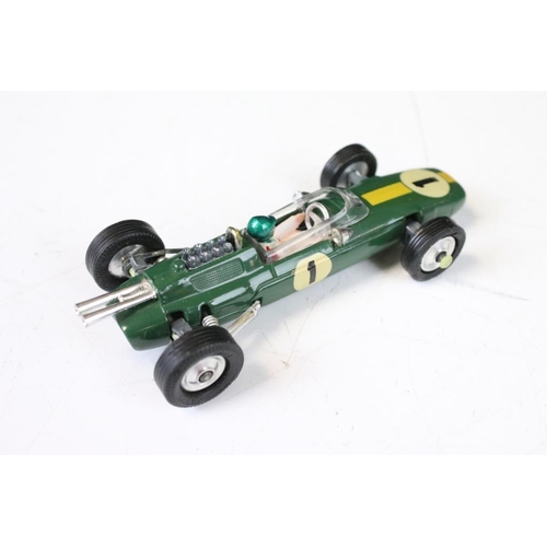 1338 - Three boxed Corgi F1 diecast models to include 154 Ferrari Racing Car, 155 Lotus Climax and 156 Coop... 