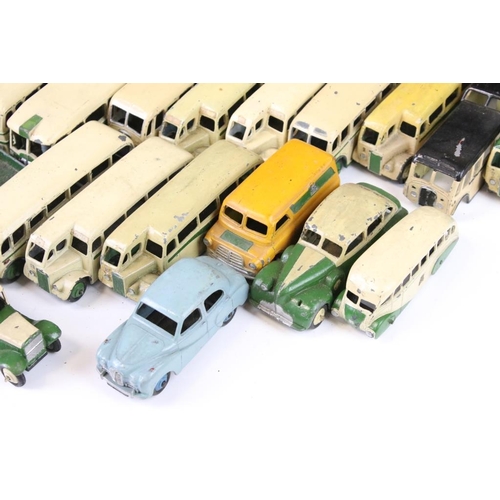 1352 - Around 60 early-mid 20th C play worn Dinky diecast models mainly featuring buses and public transpor... 