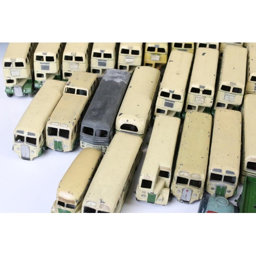 1352 - Around 60 early-mid 20th C play worn Dinky diecast models mainly featuring buses and public transpor... 