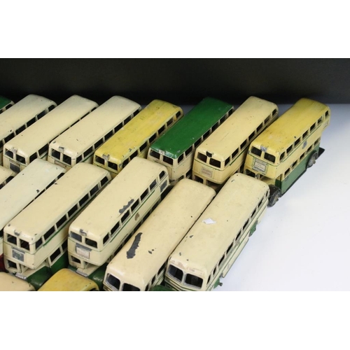 1352 - Around 60 early-mid 20th C play worn Dinky diecast models mainly featuring buses and public transpor... 