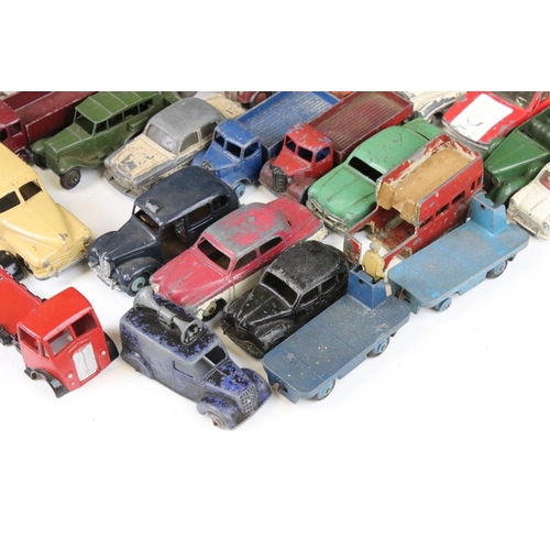 1288 - Around 37 mid 20th C. play worn Dinky diecast models to include 344 Plymouth Estate Car, De Tomaso M... 