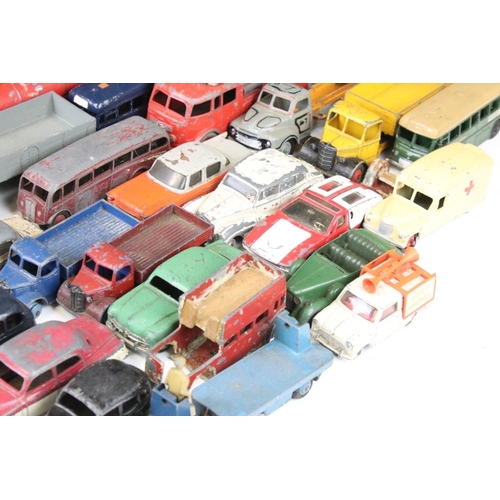 1288 - Around 37 mid 20th C. play worn Dinky diecast models to include 344 Plymouth Estate Car, De Tomaso M... 