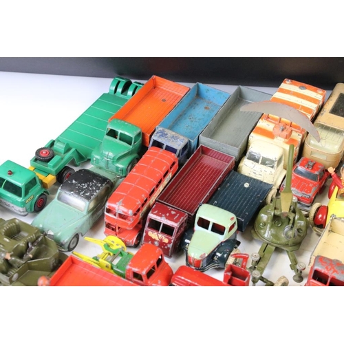 1292 - Over 40 mostly mid 20th C play worn diecast models, to include Dinky, Corgi, Triang & Matchbox examp... 