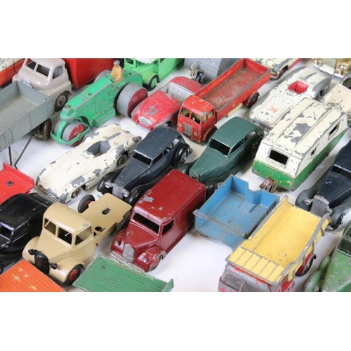 1293 - Around 45 mid 20th C. play worn Dinky diecast models to include a 162 Ford Zephyr, 157 Jaguar, Ford ... 