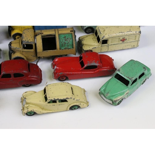 1299 - 15 Mid 20th C play worn Dinky diecast models to include a boxed Supertoys 660 Tank Transporter, Blaw... 