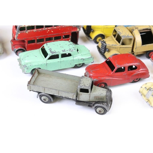 1299 - 15 Mid 20th C play worn Dinky diecast models to include a boxed Supertoys 660 Tank Transporter, Blaw... 