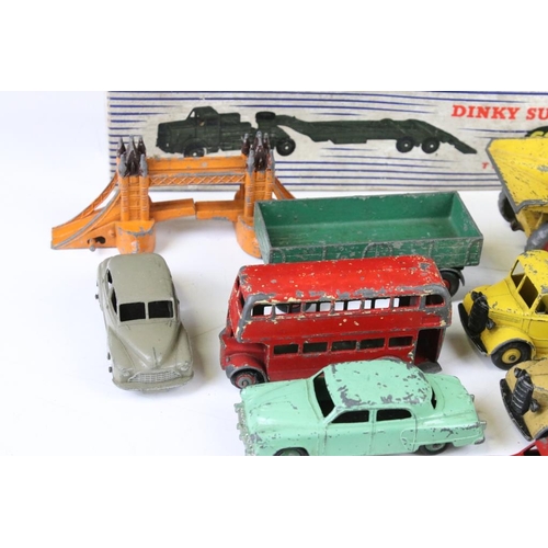 1299 - 15 Mid 20th C play worn Dinky diecast models to include a boxed Supertoys 660 Tank Transporter, Blaw... 