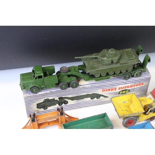 1299 - 15 Mid 20th C play worn Dinky diecast models to include a boxed Supertoys 660 Tank Transporter, Blaw... 