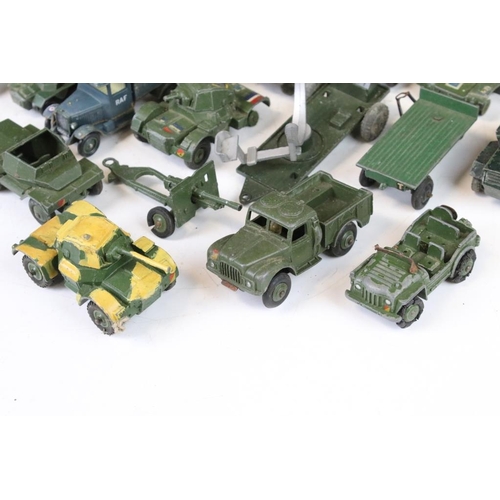 1301 - Around 27 mid 20th C. play worn military diecast models, to include Corgi, Dinky, Matchbox, Lone Sta... 