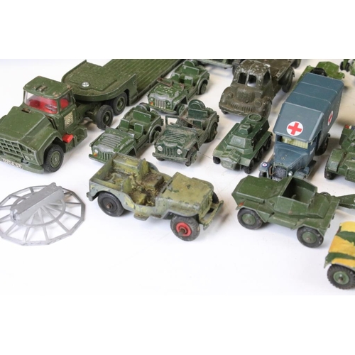 1301 - Around 27 mid 20th C. play worn military diecast models, to include Corgi, Dinky, Matchbox, Lone Sta... 