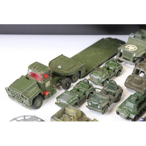 1301 - Around 27 mid 20th C. play worn military diecast models, to include Corgi, Dinky, Matchbox, Lone Sta... 