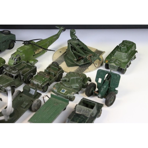 1301 - Around 27 mid 20th C. play worn military diecast models, to include Corgi, Dinky, Matchbox, Lone Sta... 