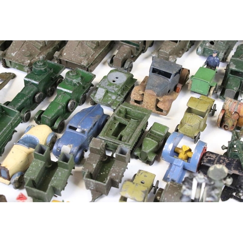 1353 - Collection of early 20th C play worn diecast models to include Hornby, Dinky, Britains etc, showing ... 