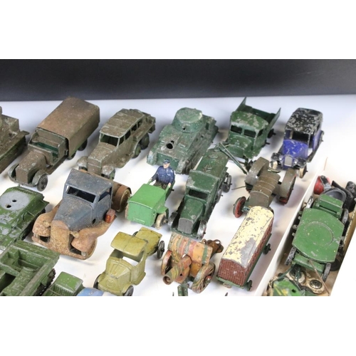 1353 - Collection of early 20th C play worn diecast models to include Hornby, Dinky, Britains etc, showing ... 